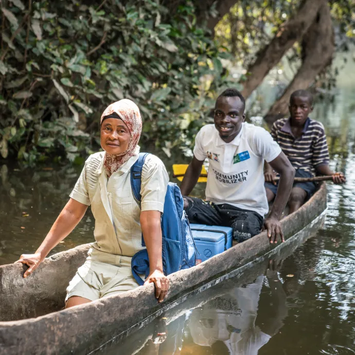 Bombali District in Sierra Leone features lowlands between 2 long rivers, the Rokel and Mobole; Nurse Kai, accompanied by community mobiliser Jeremiah, sometimes needed to use dugout canoes to village patients.